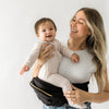 Tushbaby Original Hip Seat Baby Carrier for Babies & Toddlers up to 45 lbs, Safety Certified, Lightweight No-Foam Design with Storage & Nursing Support, Grey - Black/Gold