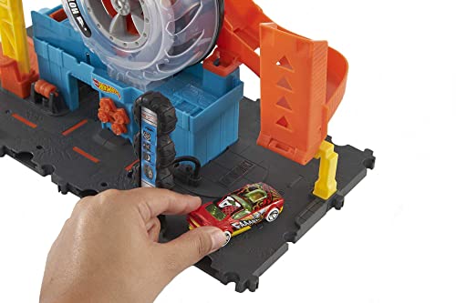 Buy now Hot Wheels City Super Twist Tire Shop Playset, Spin The Key to Make Cars Travel Through The Tires, Includes 1 Car, Gift for Kids 4 to 8 Years Old (Amazon Exclusive) at indiglob india