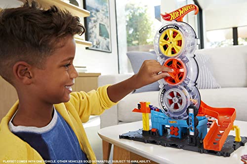 Buy now Hot Wheels City Super Twist Tire Shop Playset, Spin The Key to Make Cars Travel Through The Tires, Includes 1 Car, Gift for Kids 4 to 8 Years Old (Amazon Exclusive) at indiglob india