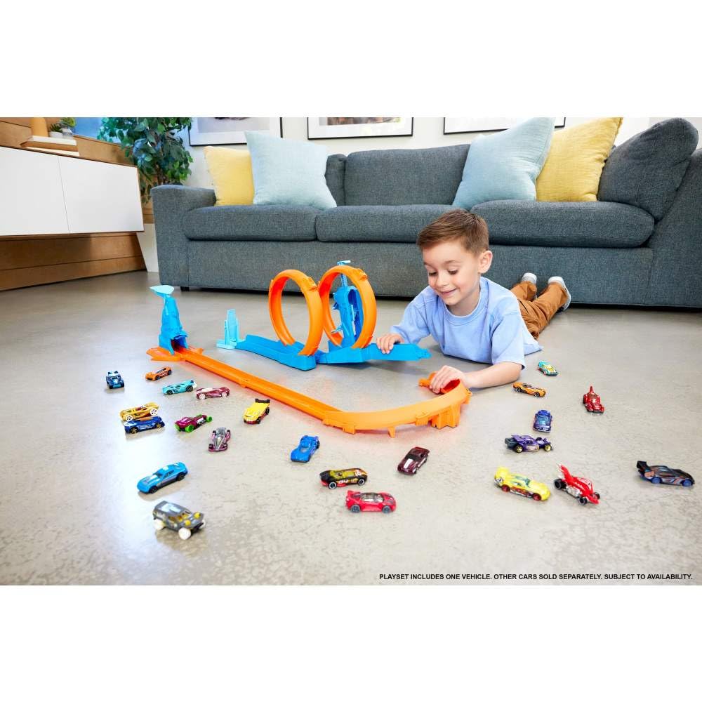 Buy now Hot Wheels Toy Car Track Set, Triple Loop Pack & 1:64 Scale Vehicle, Track-Building Components with 3 Loops, Speed Snap Tracks & Adapters at indiglob india