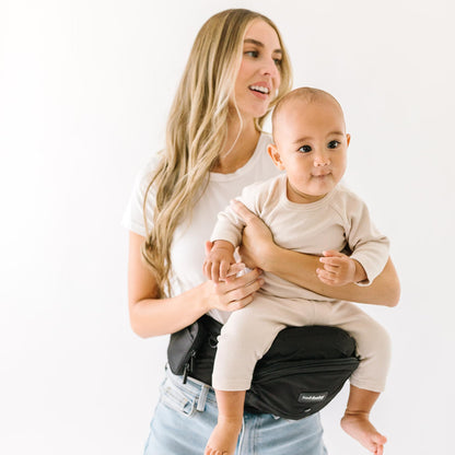 Buy now Tushbaby Original Hip Seat Baby Carrier for Babies & Toddlers up to 45 lbs, Safety Certified, Lightweight No-Foam Design with Storage & Nursing Support, Grey Black at indiglob india