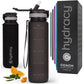 Hydracy Water Bottle with Time Marker -Large BPA Free Water Bottle & No Sweat Sleeve -Leak Proof Gym Bottle with Fruit Infuser Strainer & Times to Drink -Ideal for Fitness Sports & Outdoors