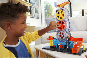 Buy now Hot Wheels City Super Twist Tire Shop Playset, Spin The Key to Make Cars Travel Through The Tires, Includes 1 Car, Gift for Kids 4 to 8 Years Old (Amazon Exclusive) at indiglob india