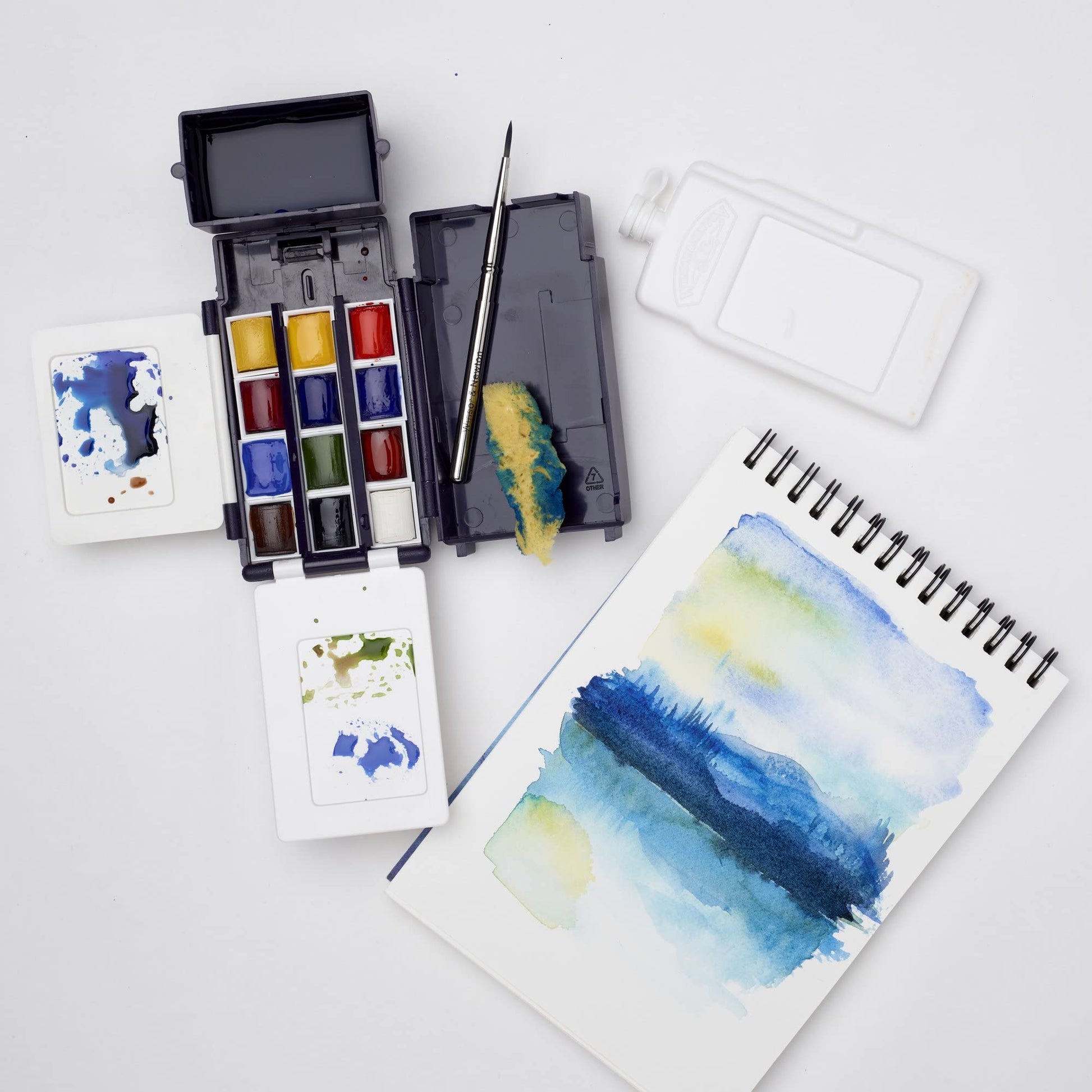 Buy now Winsor & Newton Cotman Watercolor Paint Set, Field Pocket Set, 12 Half Pan w/ Brush, Sponge, Bottle at indiglob india