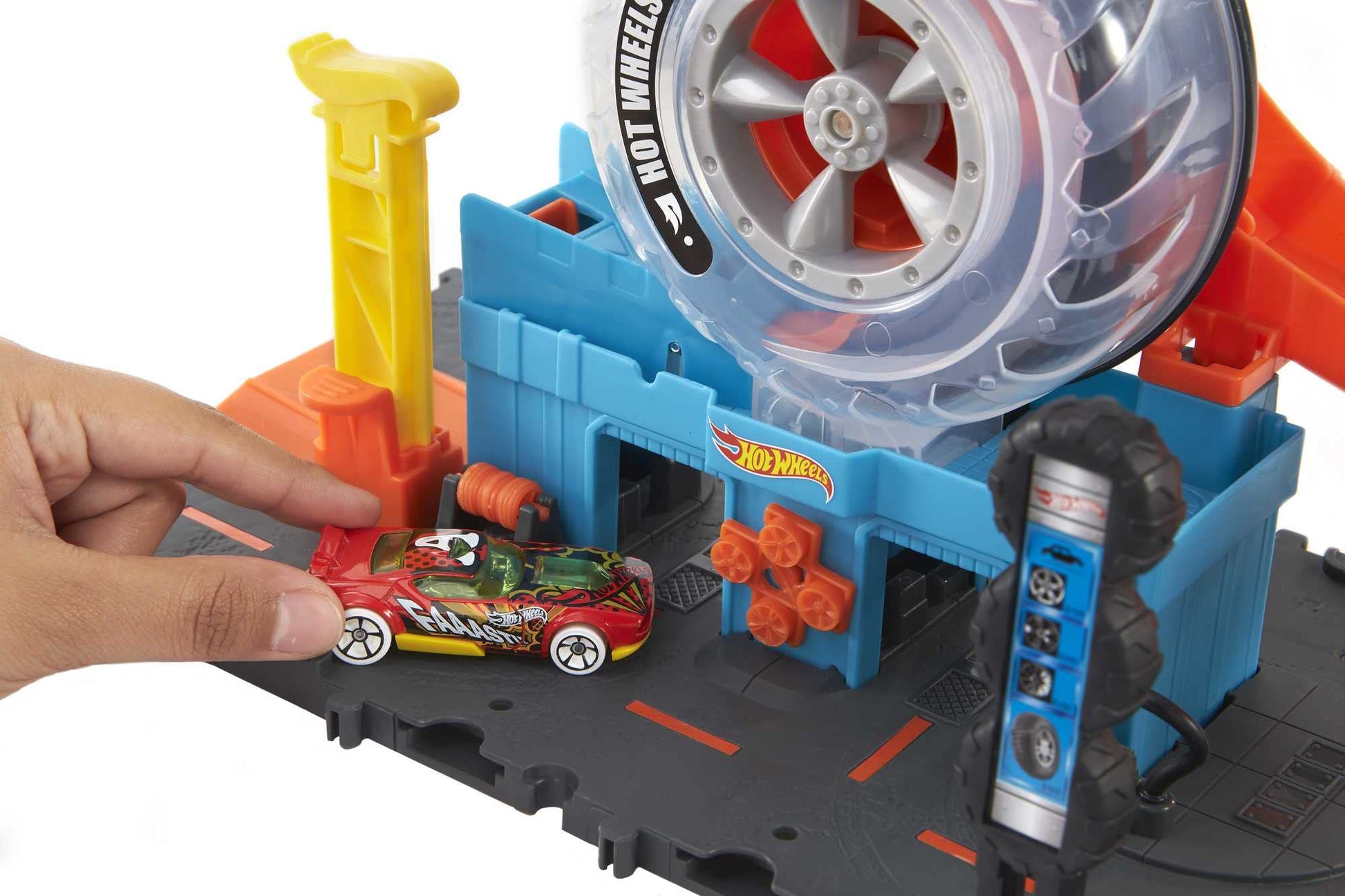 Buy now Hot Wheels City Super Twist Tire Shop Playset, Spin The Key to Make Cars Travel Through The Tires, Includes 1 Car, Gift for Kids 4 to 8 Years Old (Amazon Exclusive) at indiglob india