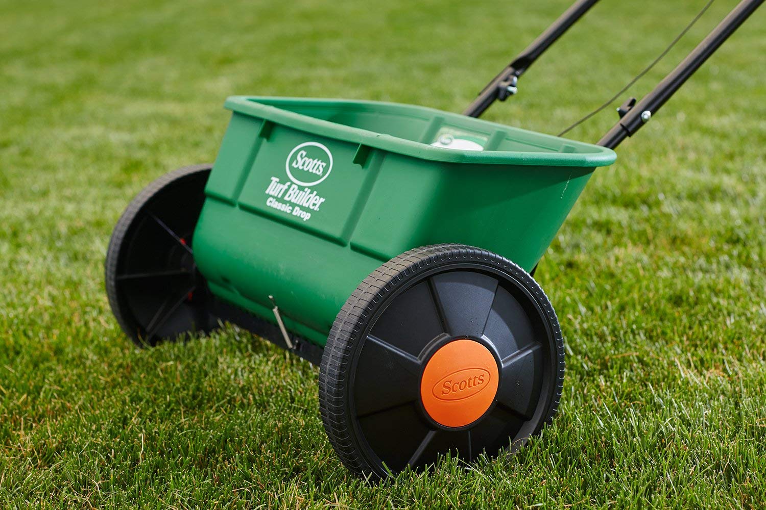 Buy now Scotts Turf Builder EdgeGuard DLX Broadcast Spreader for Seed, Fertilizer, Salt, Ice Melt, Holds up to 15,000 sq.ft. Product at indiglob india