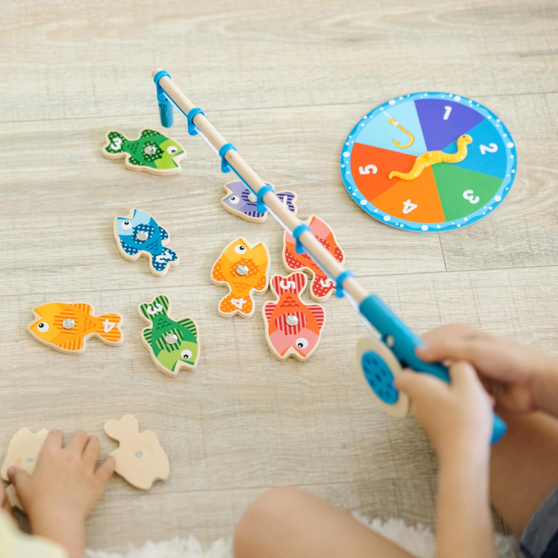 Buy now Melissa & Doug Catch & Count Wooden Fishing Game With 2 Magnetic Rods at indiglob india