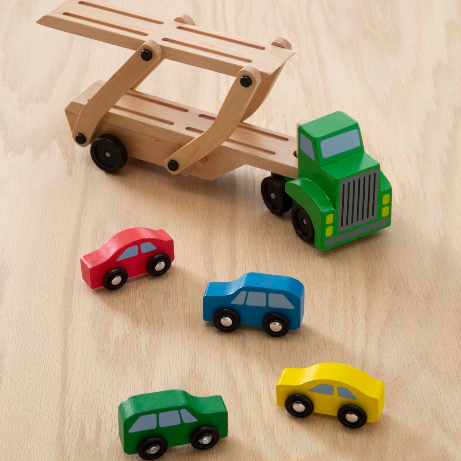 Buy now Melissa & Doug Car Carrier Truck and Cars Wooden Toy Set with 1 Truck and 4 Cars 5.75" x 12" x 3" at indiglob india