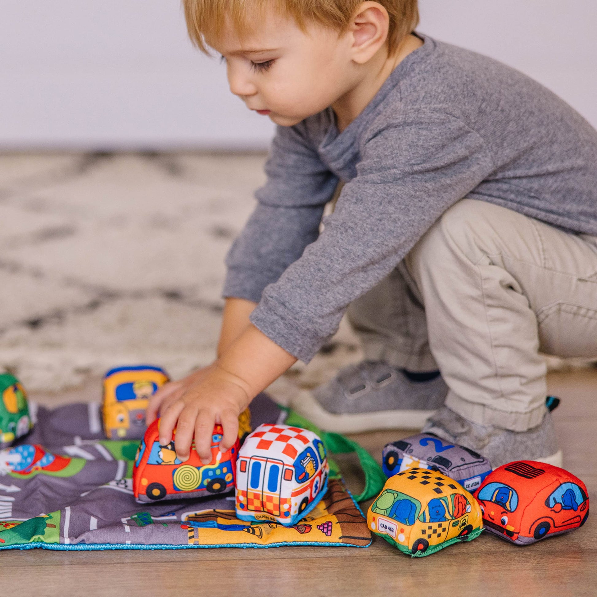 Buy now Melissa & Doug Take-Along Town Play Mat (19.25 x 14.25 inches) with 9 Soft Vehicles at indiglob india