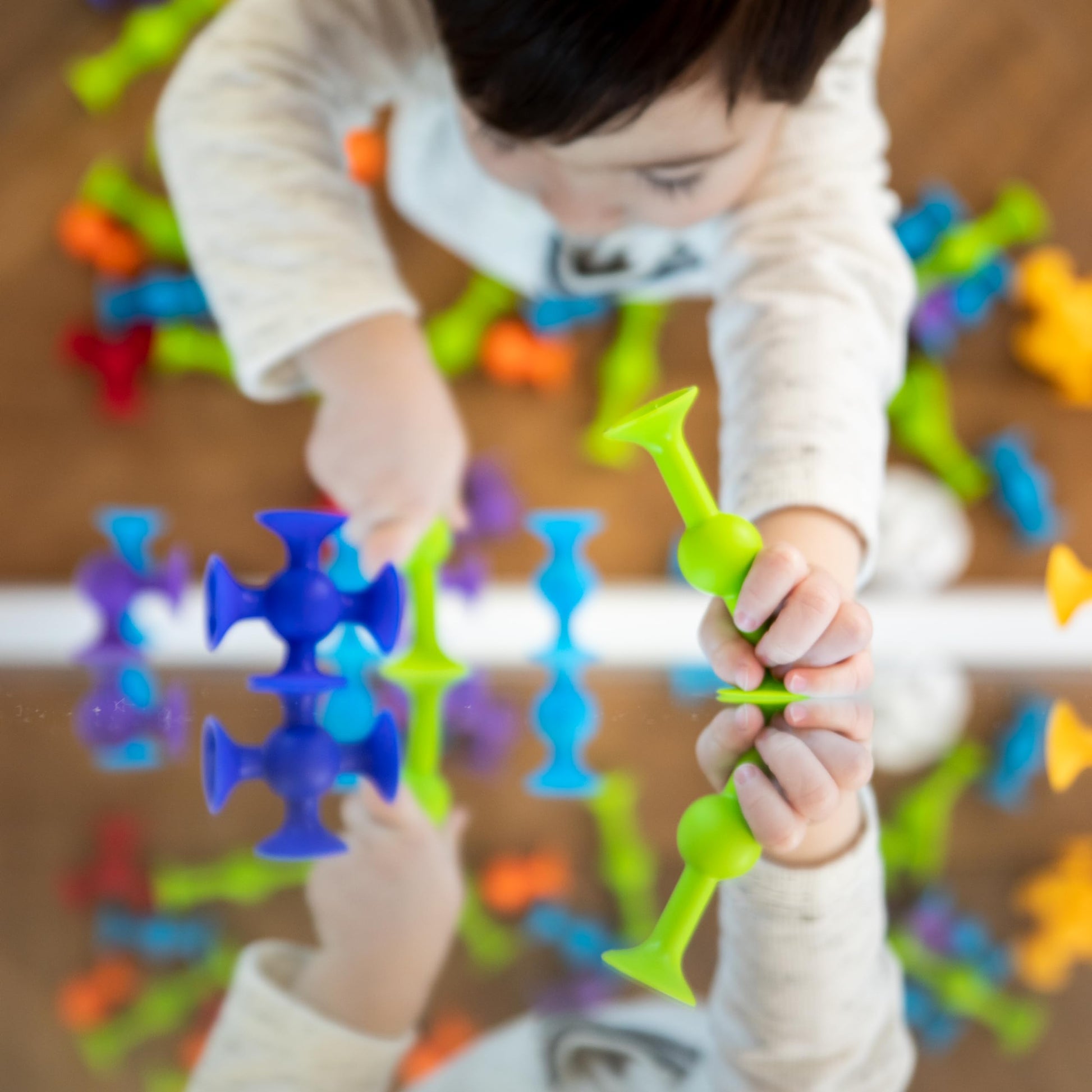 Buy now Fat Brain Toys Squigz Starter Set, 24 Piece Suction Bath Toys, Sensory Toys for Kids 3 and Up at indiglob india